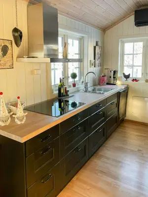 a kitchen with a sink and a counter top at Family Cabin With Views In Sør-Fron in Sør-Fron