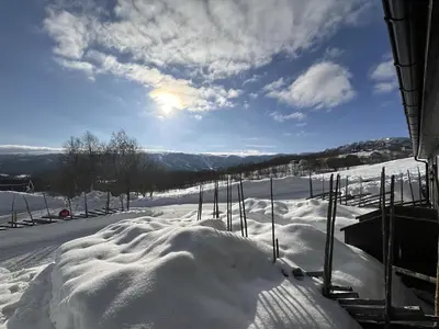 a pile of snow on a ski slope at Cozy Two Bedrooms Apartment With Sauna And Mountain Views in Beitostøl