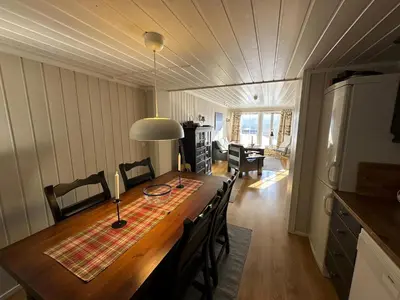 a kitchen and dining room with a table and chairs at Cozy Two Bedrooms Apartment With Sauna And Mountain Views in Beitostøl