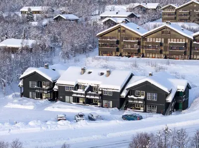 an aerial view of a resort in the snow at Family-Friendly Apartment In Central Beitostølen in Beitostøl