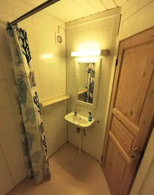 a small bathroom with a sink and a mirror at Hemsedal - 7 bedrooms - WI-FI in Hemsedal