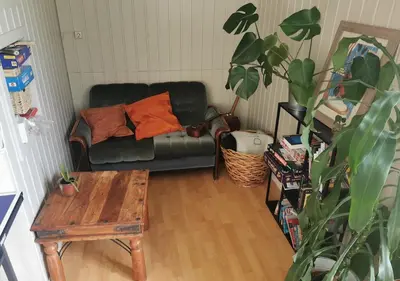a living room with a couch and a table at Hemsedal - 7 bedrooms - WI-FI in Hemsedal