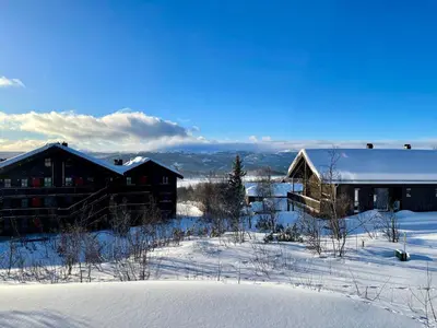 a group of buildings in the snow at Charming 2-Bedroom Apartment In Beitostølen in Beitostøl