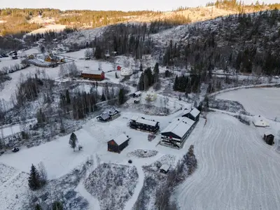 an aerial view of a house in the snow at Solheimen konferansehotell AS in Hedalen
