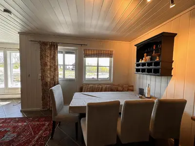 a dining room with a table and chairs at Beitotind 1504 in Beitostøl