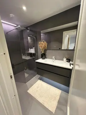 a bathroom with a sink and a mirror at Leilighet i trondheim in Trondheim