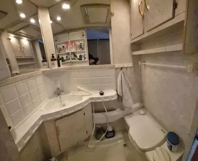 a bathroom with a sink and a toilet at Trysil Campingvogn Ski in-out in Trysil