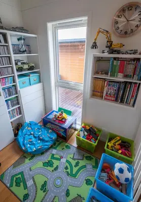 a childs room with toys on the floor at Spacious house, close to Granåsen Ski Arena! 4 beds, 2 bathrooms, free parking in Trondheim