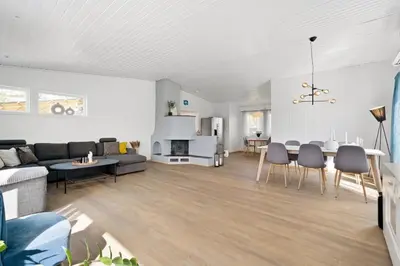 a living room with a couch and a table at World Cup Trondheim 2025 in Trondheim