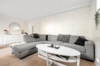 a living room with a couch and a table at World Cup Trondheim 2025 in Trondheim