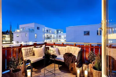 a couch sitting on top of a balcony at Trondheim VM-arena in Trondheim
