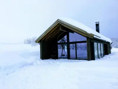 a small building with snow on top of it at Rabbelia by Norgesbooking - cabin in great hiking and skiing area in Ål