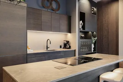 a kitchen with a sink and a counter top at Penthouse with fjord view and parking in Sogndal