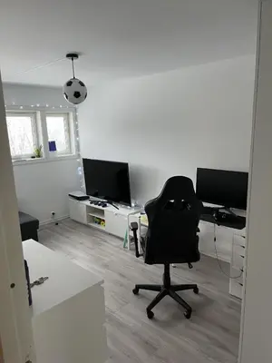 an office with a chair and a desk with a computer at Trondheim in Trondheim