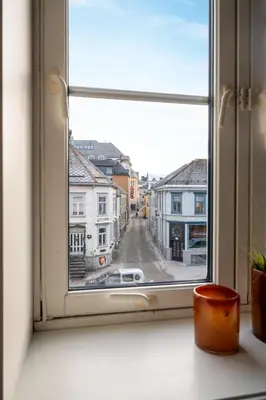 an open window with a view of a street at 3F - In the heart of Trondheim in Trondheim