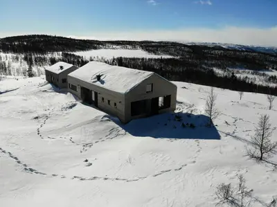 an aerial view of a house in the snow at Cabin Overlooking Hallingskarvet National Park in Geilo