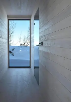 a door leading to a room with a window at Cabin Overlooking Hallingskarvet National Park in Geilo