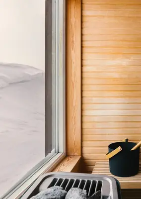 a room with a window with a heater next to it at Architect Drawn Holiday Home Near Rondane Park in Høvringen