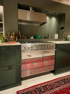 a kitchen with a large oven in a kitchen at Historic Old Rectory In The Heart Of Norway in Vestre Gausdal