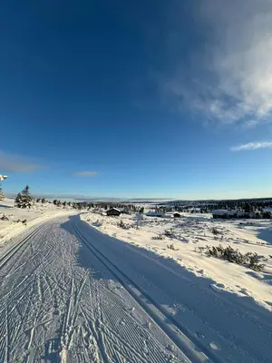 an empty road with snow on the ground at Family-Friendly Cabin In Nordseter Near Ski Trails in Lillehammer