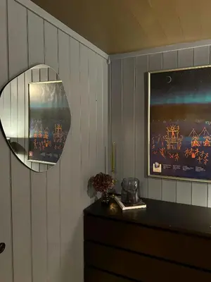 a room with a dresser and a mirror and a dresser at Family-Friendly Cabin In Nordseter Near Ski Trails in Lillehammer