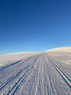 a snow covered road in the middle of a desert at Traditional Cabin With Views Of Hardangervidda in Uvdal