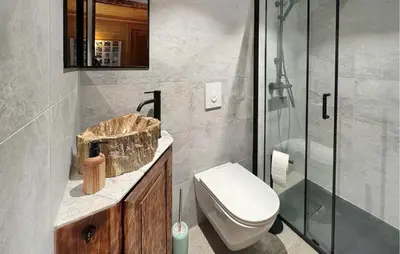 a bathroom with a sink and a toilet and a shower at 2 Bedroom Pet Friendly Home In Rendalen in Rendalen