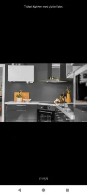 a kitchen with a stove top oven in a kitchen at Ski inn Ski Out Best holiday Apartments i Oppdal in Oppdal