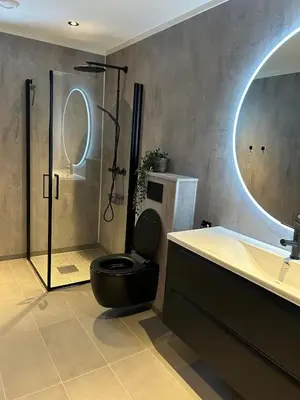 a bathroom with a toilet and a sink and a shower at Lovely apartment in beautiful Loen in Loen