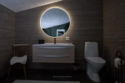 a bathroom with a sink and a mirror at Rjånes Ferie og Konferansesenter in Ørsta