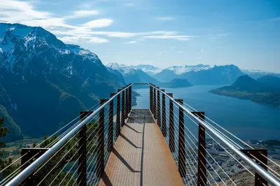 a view from the top of a viewing deck on a mountain at Sokkelleilighet i enebolig i Ålesund nær stranden in Ålesund