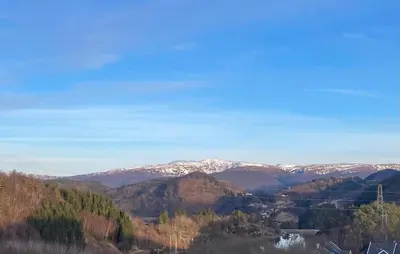 a view of a mountain range with snow covered mountains at Lovely Home In Flaktveit With Wifi in Blinde
