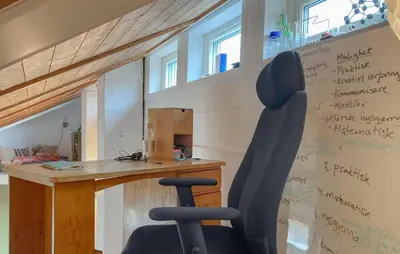 an office with a desk and a chair in a room at Lovely Home In Flaktveit With Wifi in Blinde