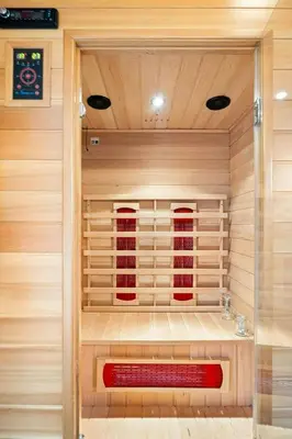 a sauna with a red bench in a room at Peaceful Cabin With Spa On Osterøy in Bruvik