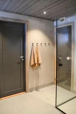 a bathroom with a shower and a glass door at Mountain Cabin By The Ski Trails In Rauland in Rauland