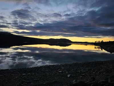 a body of water with clouds in the sky at Modern Cabin With Panoramic Views Near Langedrag in Tunhovd