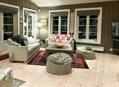a living room with couches and a coffee table at Family Cabin With Ski In Ski Out in Trysil