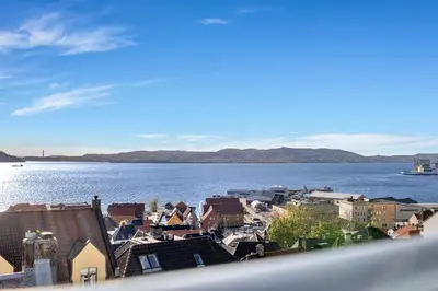 a view of a city and a body of water at Penthouse Apartment in Bergen
