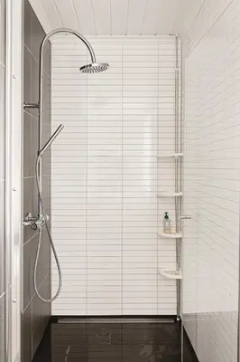 a shower with a glass door in a bathroom at Trolltunga Fjord Living in Tysso