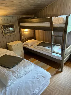 a room with two bunk beds in it at Newly renovated cabin near Ål city center, mountains & ski resort in Liagardane