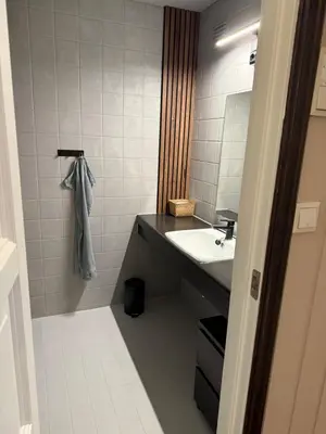 a bathroom with a sink and a mirror at Storehorn apartments, Hemsedal - 2 bedrooms, 5 beds in Torset