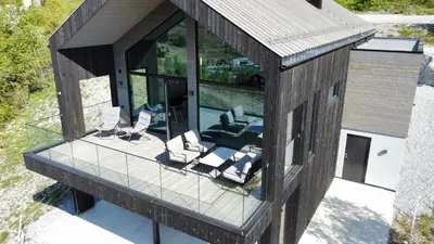 an overhead view of a house with glass at The Panoramic Chalet in Stranda