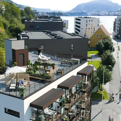 an aerial view of a building with a restaurant at Modern apartment by the sea in Bergen