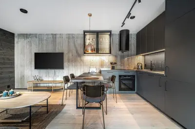 a kitchen with a table and a dining room at Apartment in Hemsedal in Hemsedal
