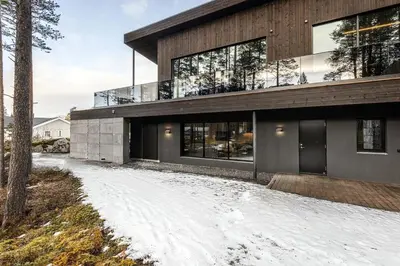 a house with a snowy driveway in front of it at Apartment in Hemsedal in Hemsedal