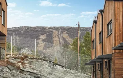 a view of the grand canyon from between two buildings at 2 Bedroom Gorgeous Home In Bjorli in Bjorli