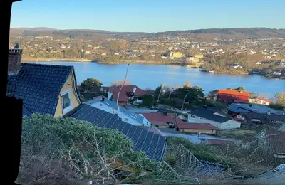 a view of a town with a body of water at Utsiken in Bergen