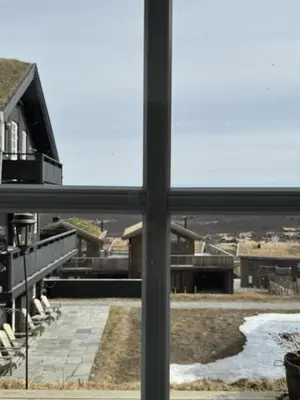 a view from a window of a house at Fully equipped ski-in ski-out apartment at Kikut, Geilo in Geilo
