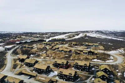 an aerial view of a village in the snow at Fully equipped ski-in ski-out apartment at Kikut, Geilo in Geilo