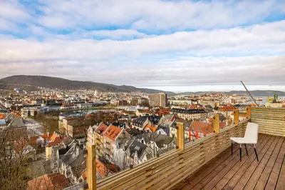 a balcony with a view of a city at Stay Panorama - Best view in Bergen l 2BR & Terrace in Bergen